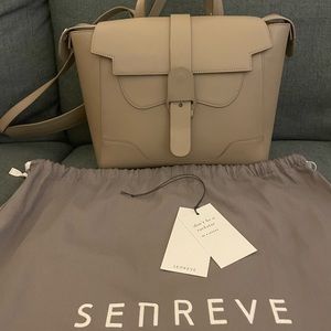 Maestra Bag (can fit 11” or 13” laptops) can be used as a backpack or crossbody